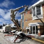 ainger's roofing in barrie team working on aroff in barrie's ice dam removal