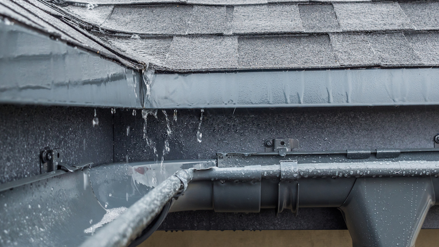 Rain running of a roof in Barrie