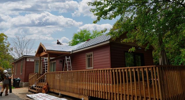 New metal roof installation by professional reroofing company