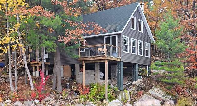 Water access shingle roof replacement in parry sound by professional reroofing contractors