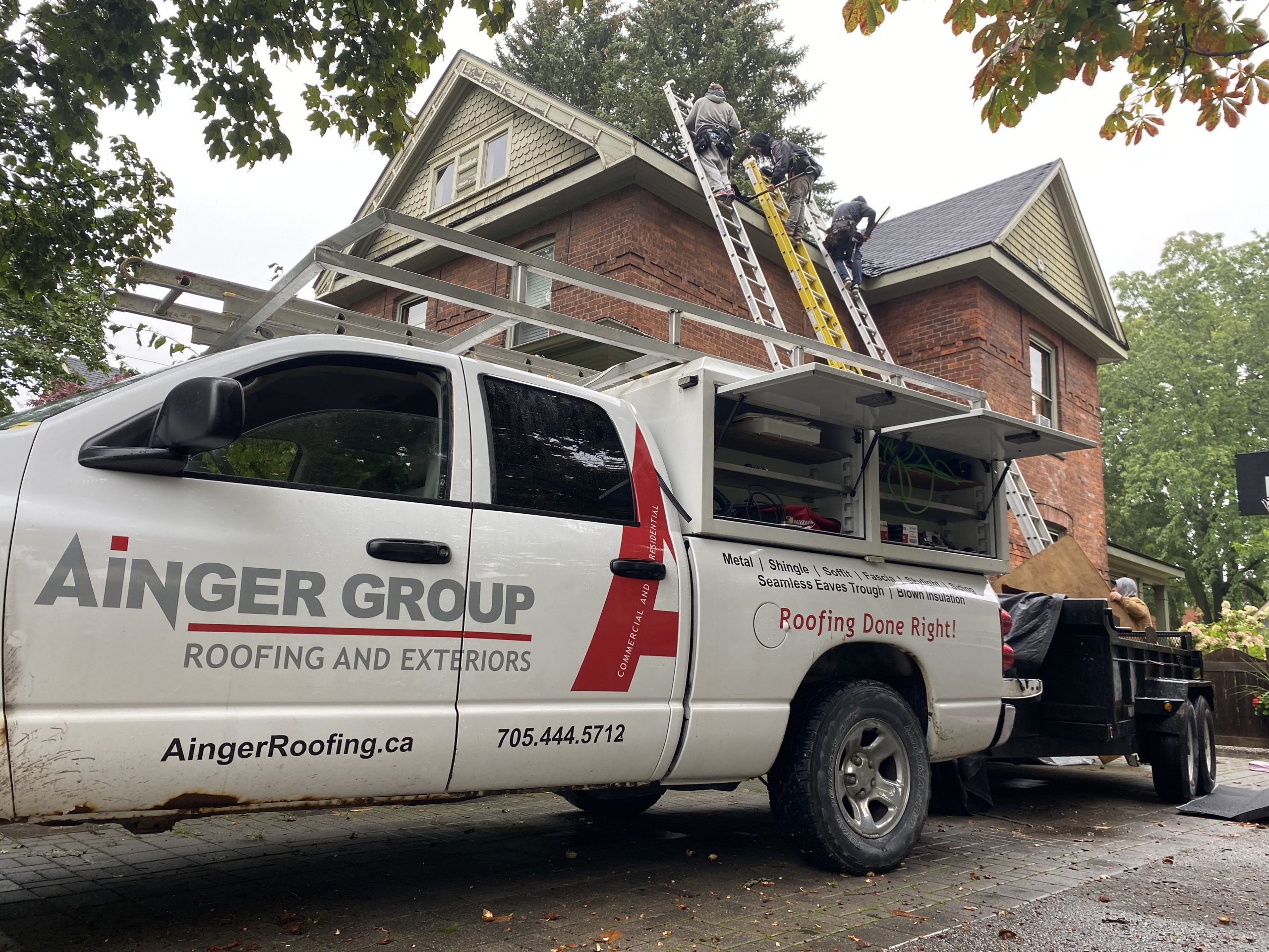 Technician performing a Roof Inspection in Barrie on a residential home