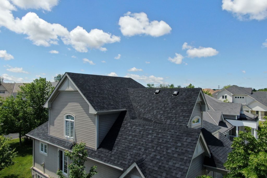 Aerial drone view of a finished shingle roof replacement in Barrie Ontario