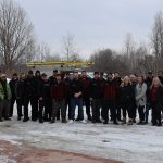 Ainger Group team gathered outside its Collingwood office during winter.