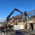 Ainger Group crew completing a residential shingle roof replacement in Collingwood, Ontario.