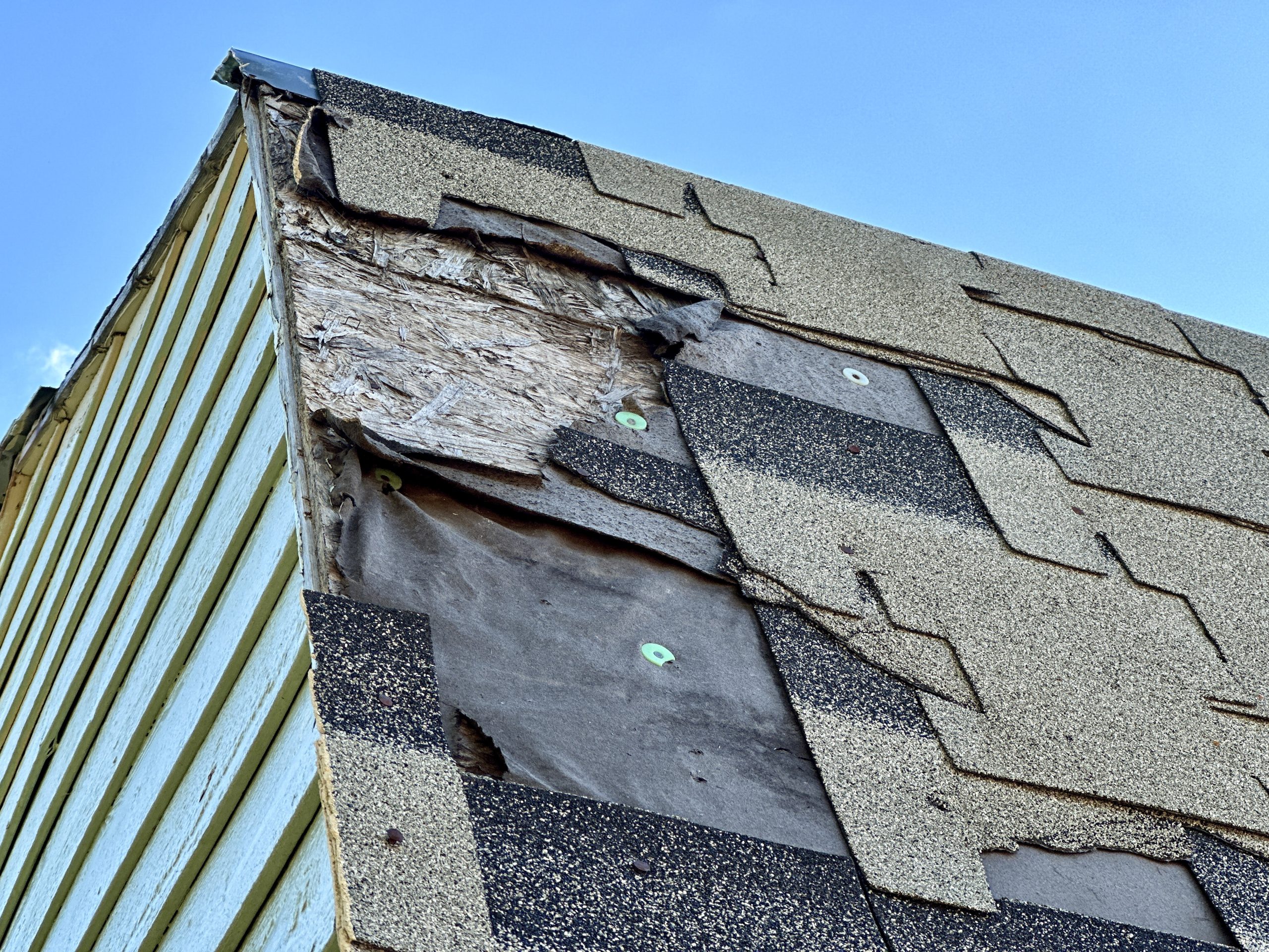 wind damaged shingles repair